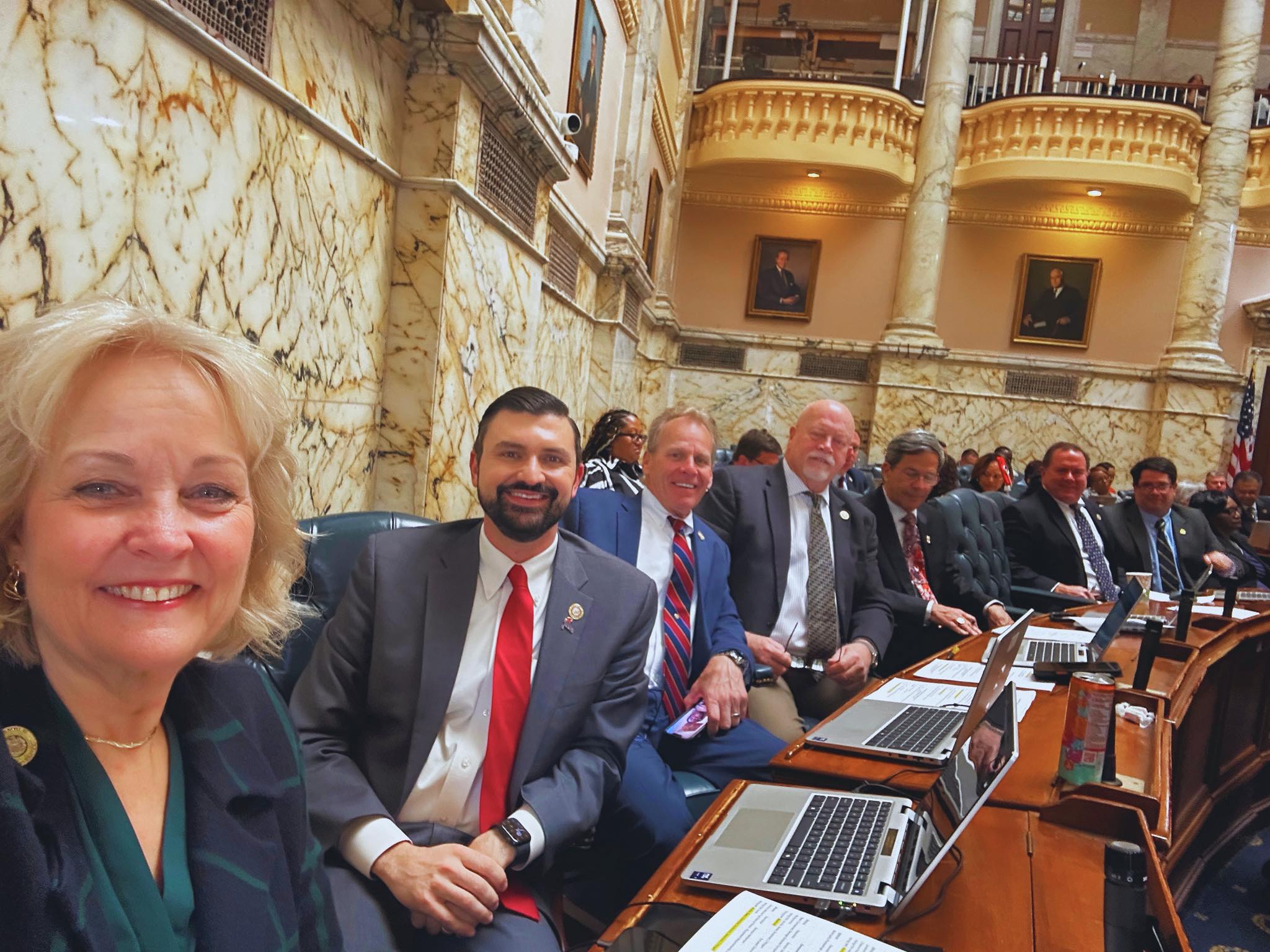 Ryan with colleagues on the floor of the Maryland House of Delegates
